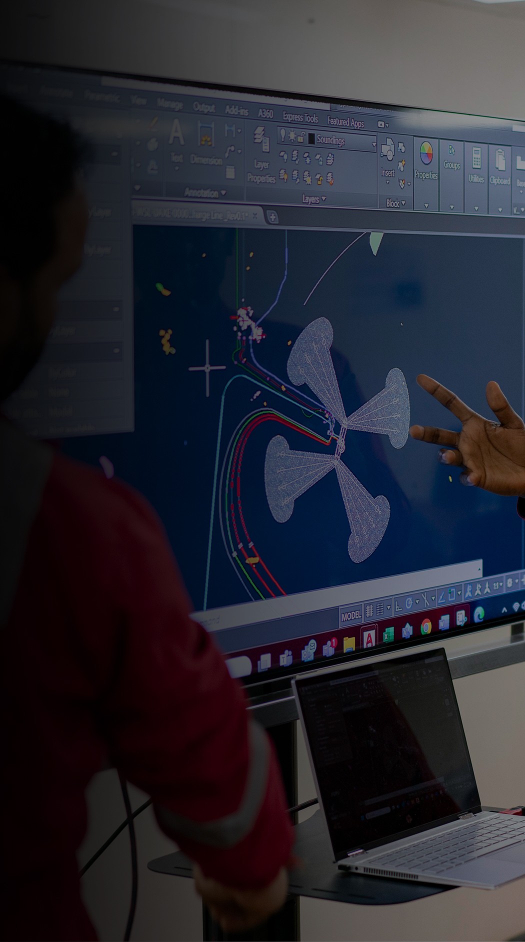 Nigerian engineer reviewing an offshore technical design